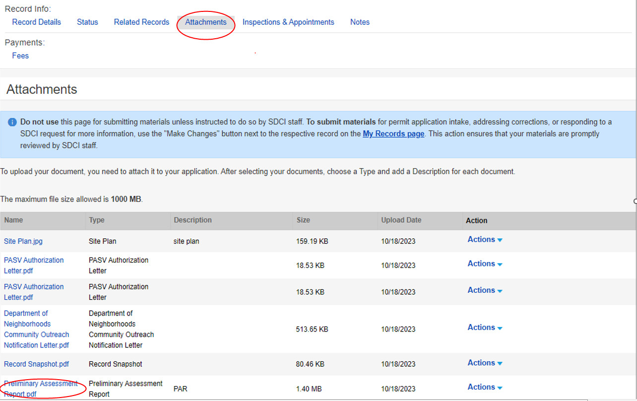 A screenshot showing the location of the attachments tab in a record information screen.