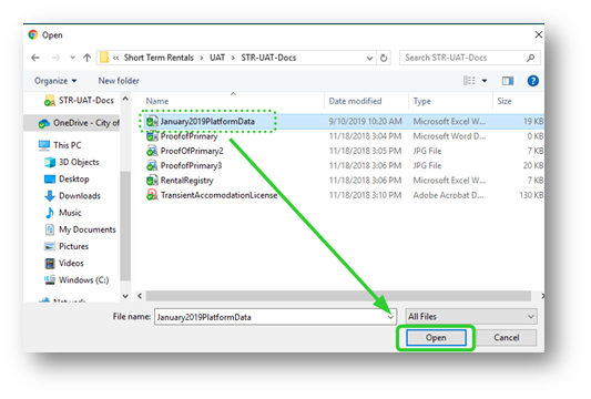 A shot of a computer drive with files on it. One excel document is highlighted and selected. A green arrow points to the Open button below.